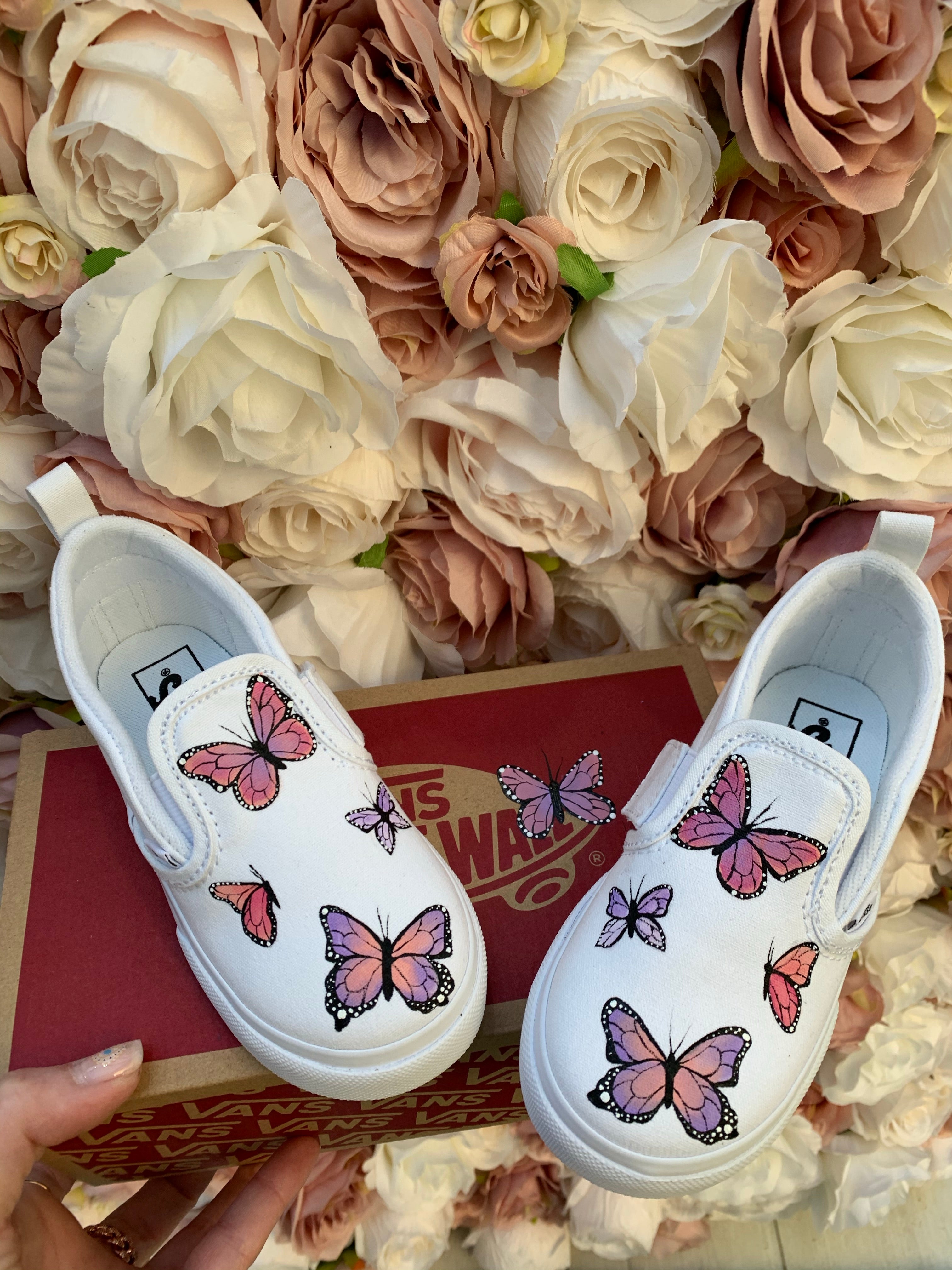 Butterfly slip on on sale vans